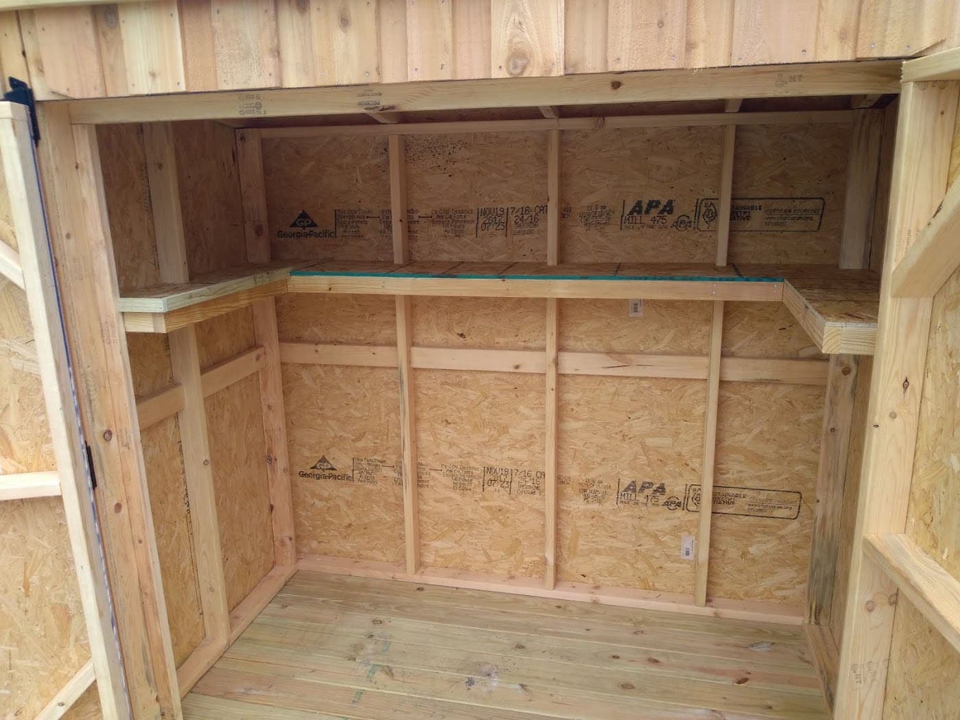 Interior of a custom storage build with framed shelving