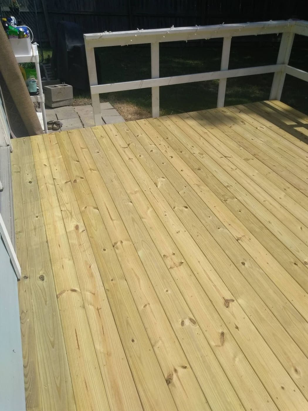 New treated pine deck off the back of a DFW home
