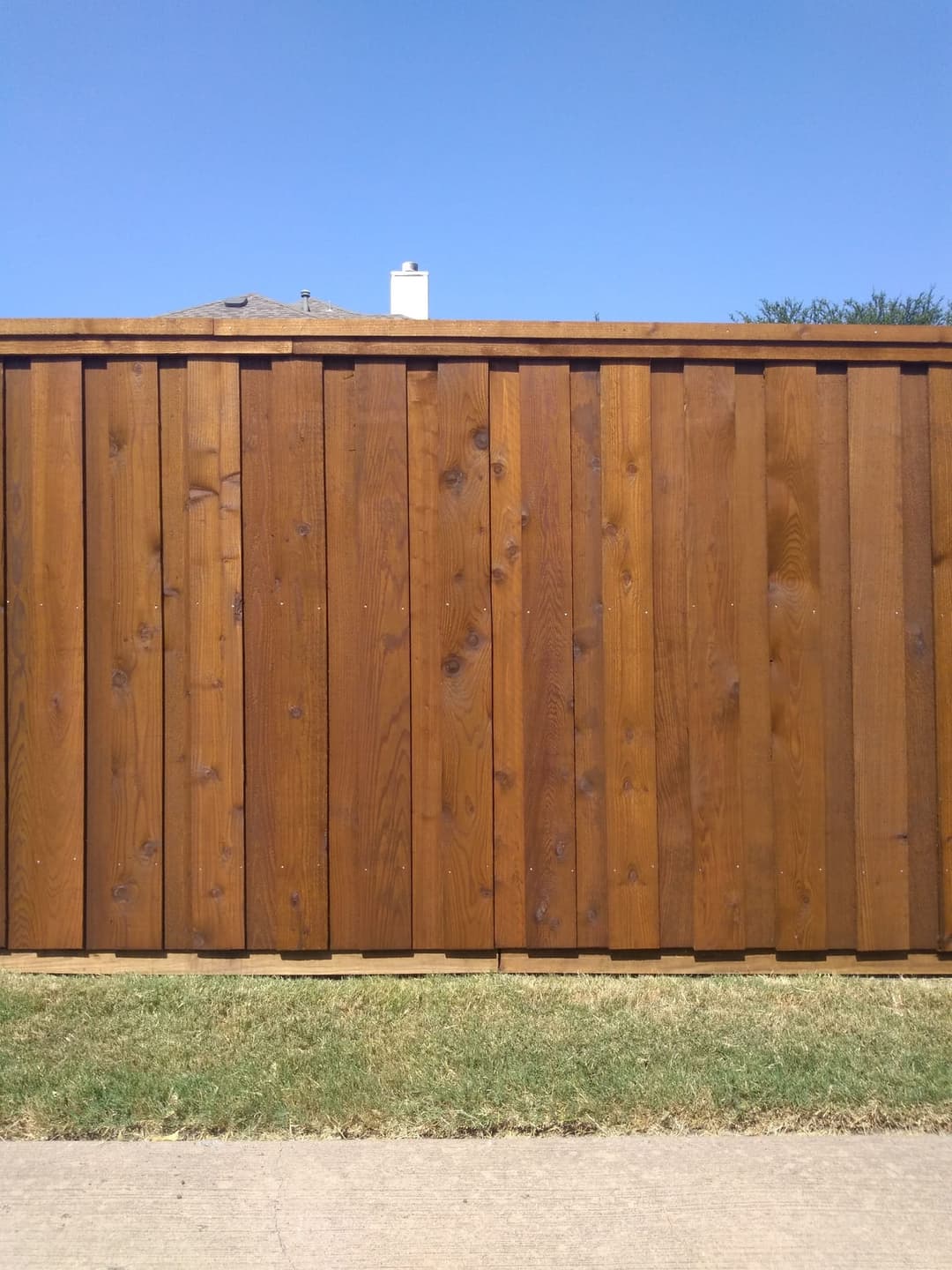 Cedar board-on-board fence by Woodchuck Millwork in Allen, TX
