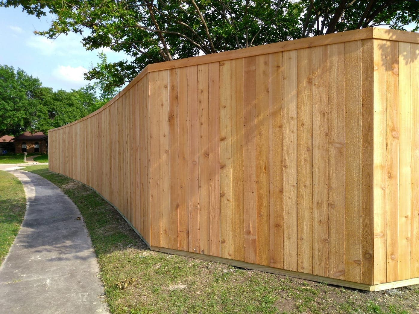 Cedar fence with stained finish in Frisco, TX
