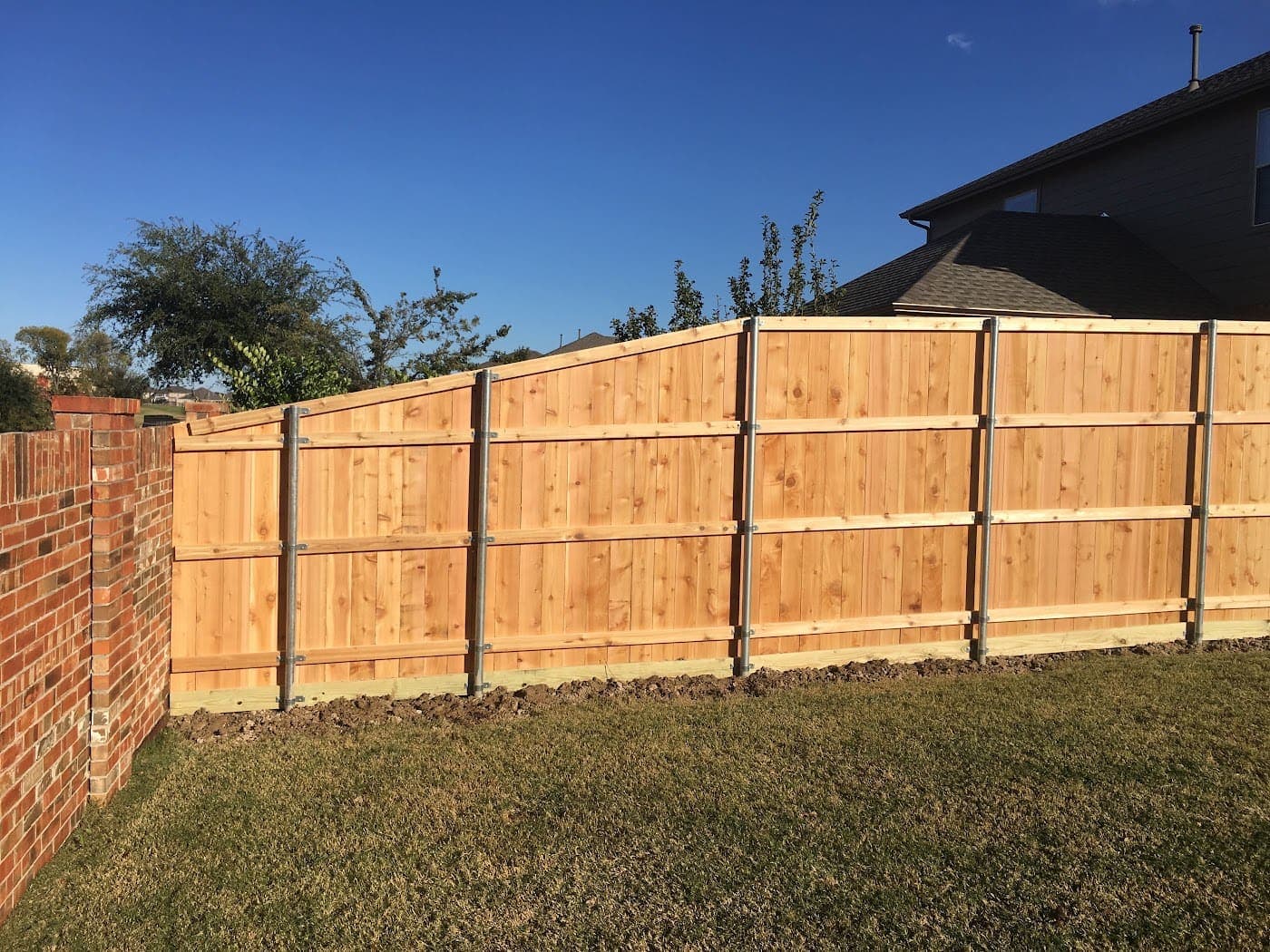 Cedar privacy fence on heavy-duty steel posts