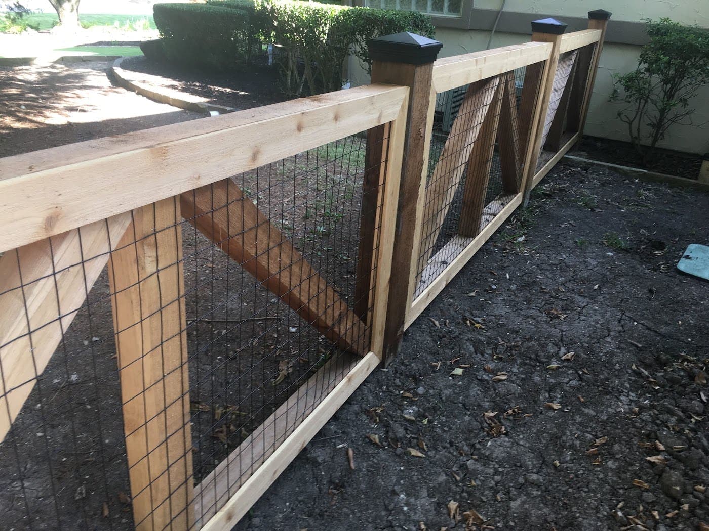 Cedar frame and wire fence — custom wood and metal