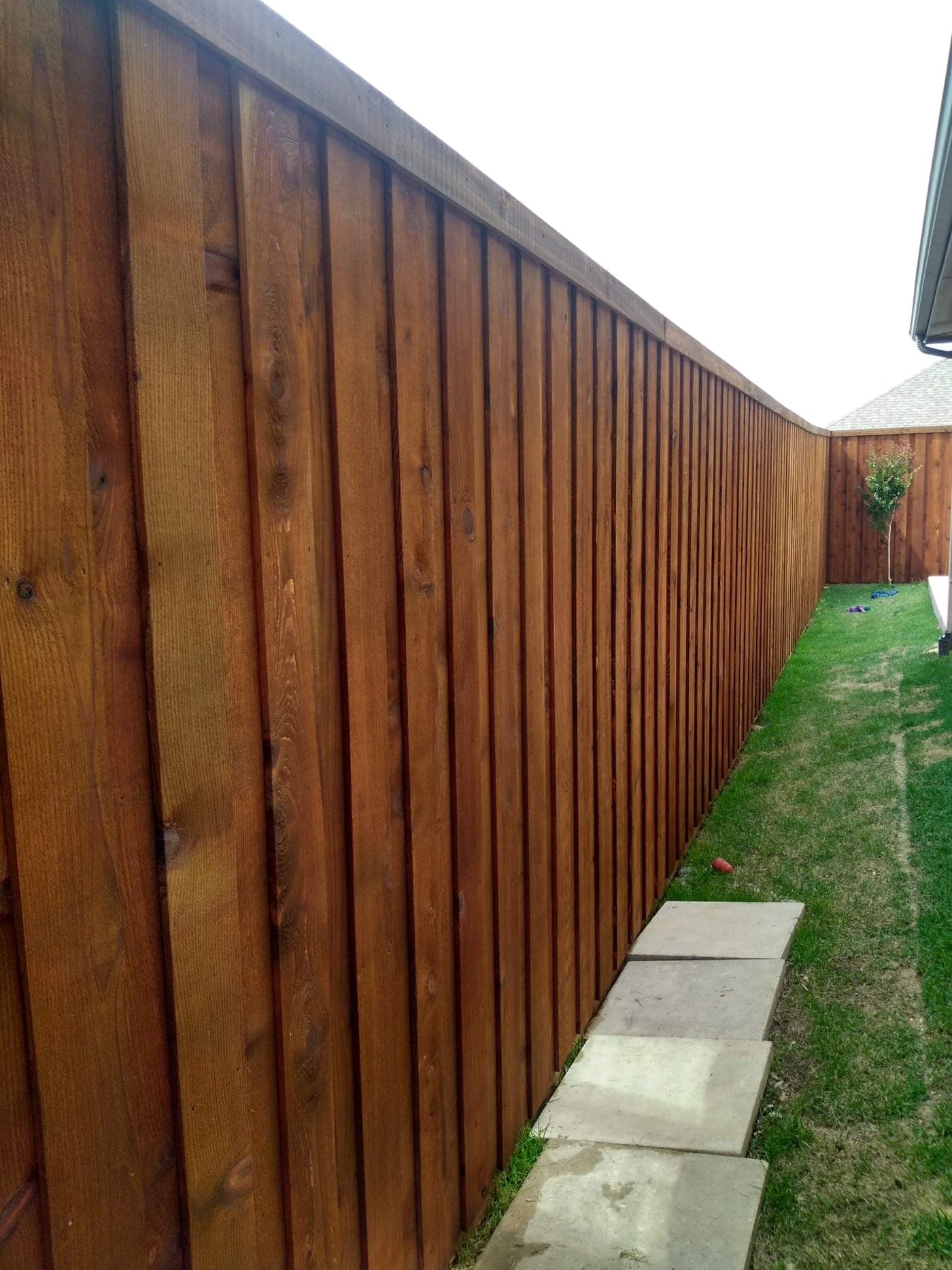 Metal rail fence with cedar pickets in Plano, TX