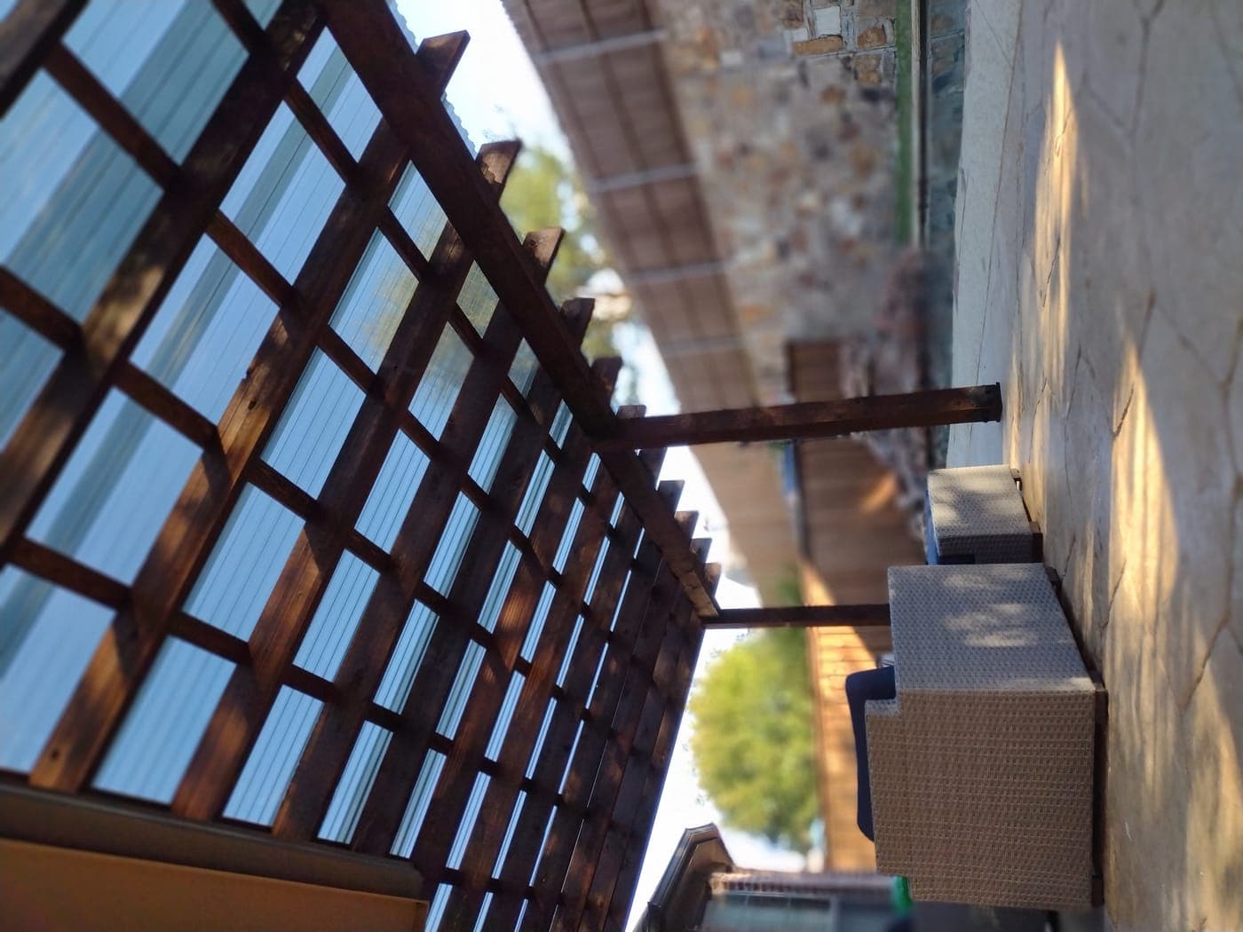 Custom cedar pergola in McKinney, TX — freestanding with corner detail