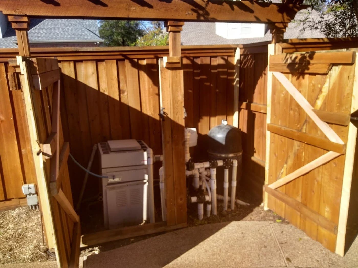 Cedar pergola built over a back patio