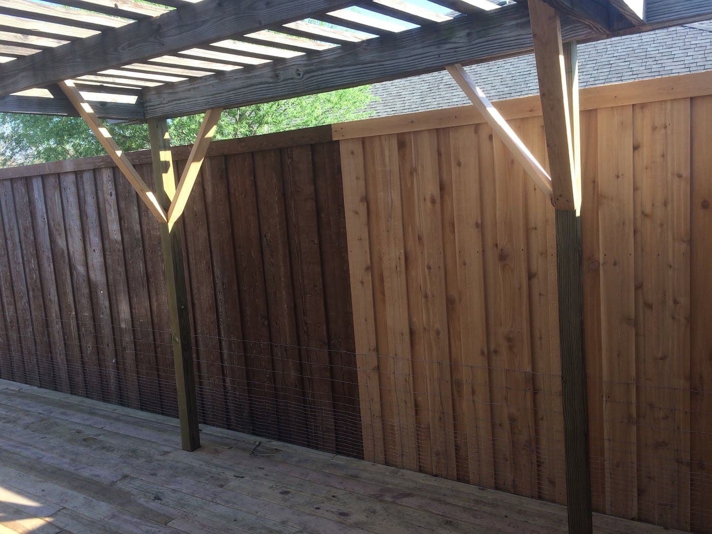 Cedar patio cover with decorative cut rafter ends